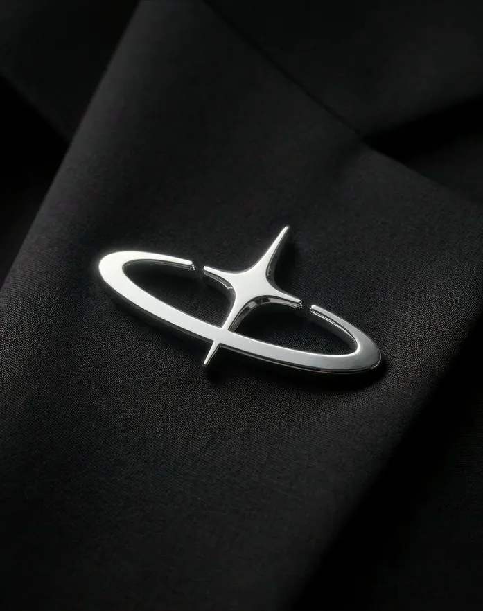 The Global Travel Solutions emblem as a metal pin