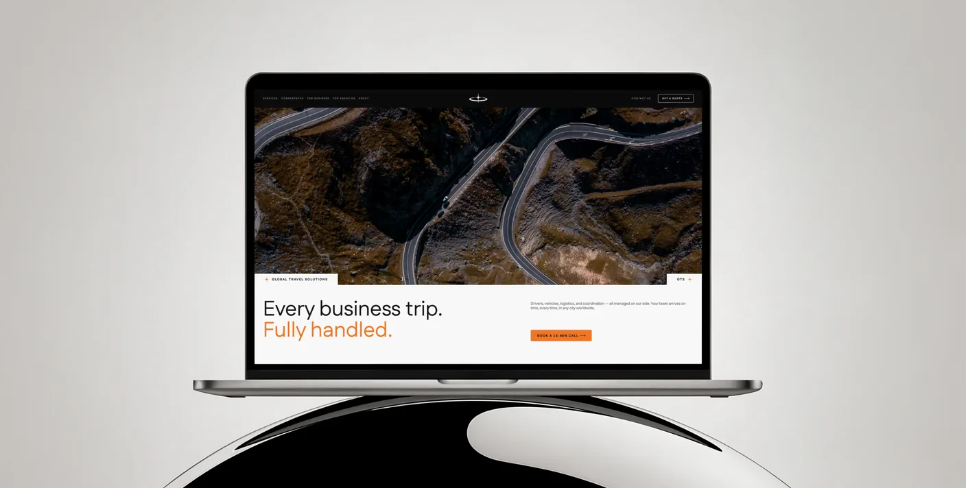 A Global Travel Solutions landing section on a MacBook
