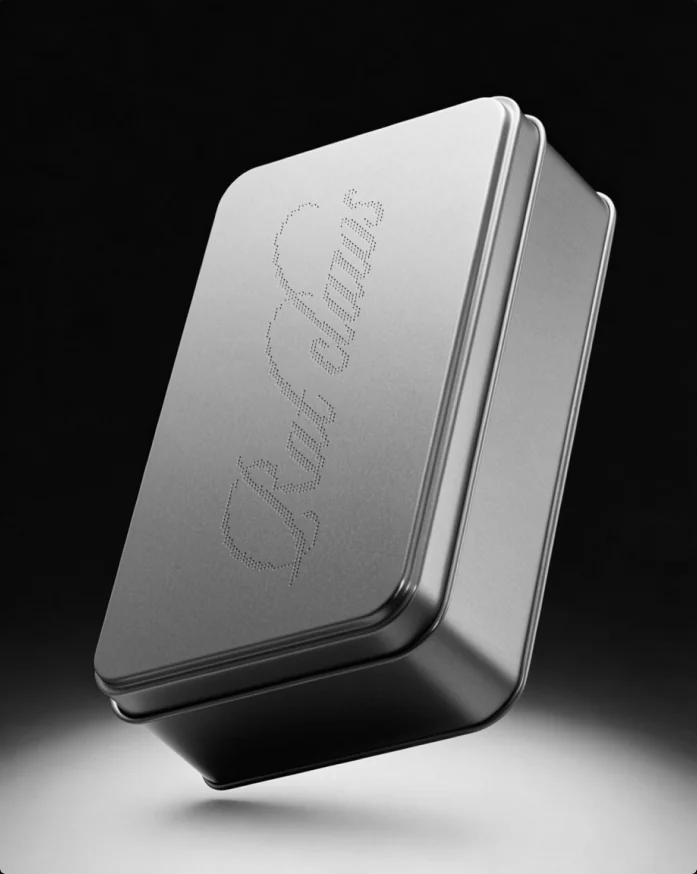 A brushed-metal Rat claws tin with the dotted script logo on the lid